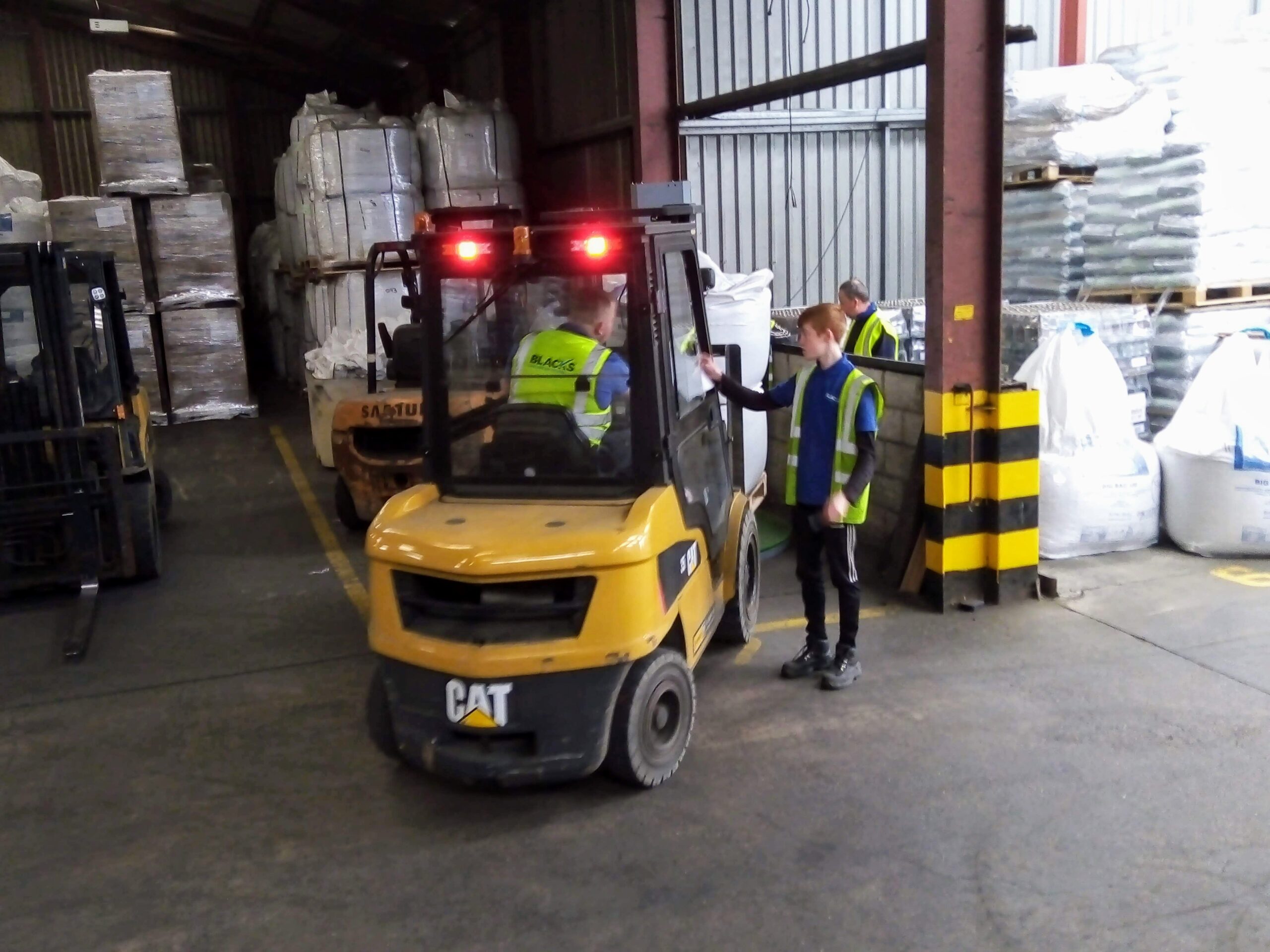 Forklift driver operating a forklift